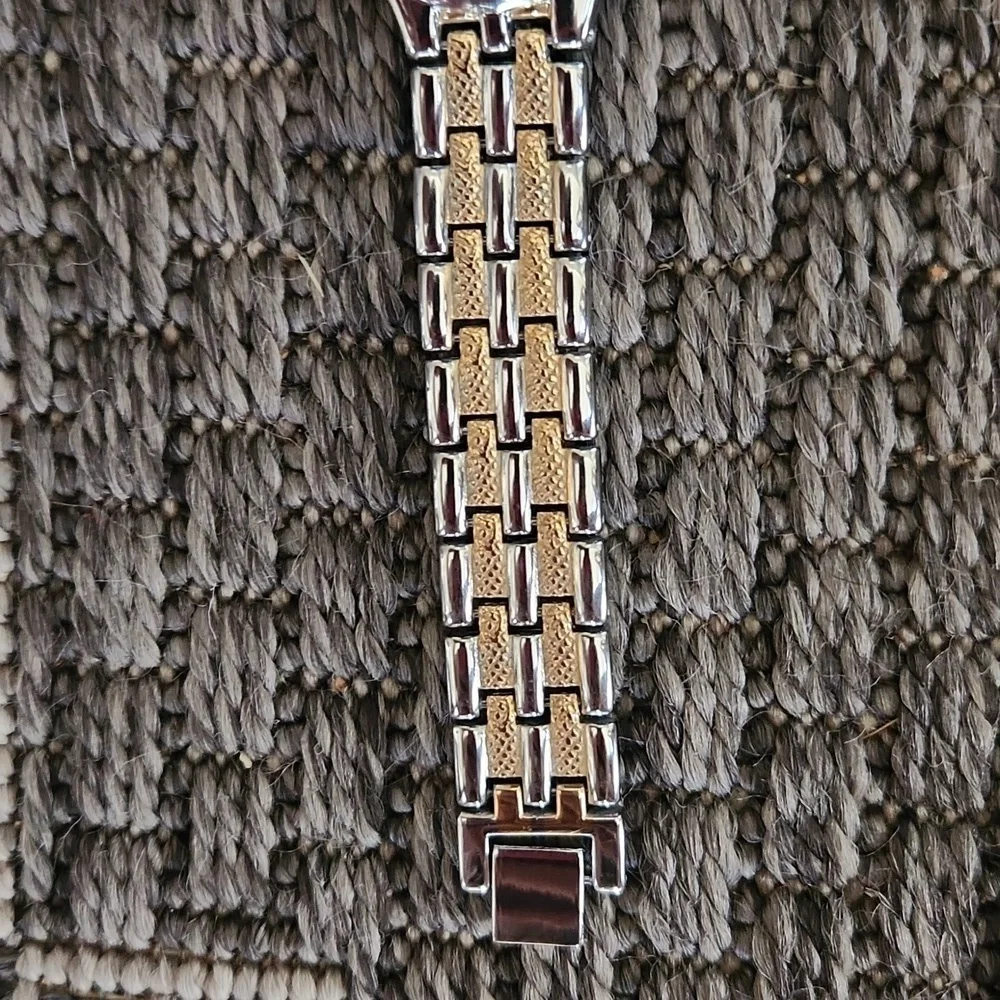 Geneva gold and‎ silver toned watch